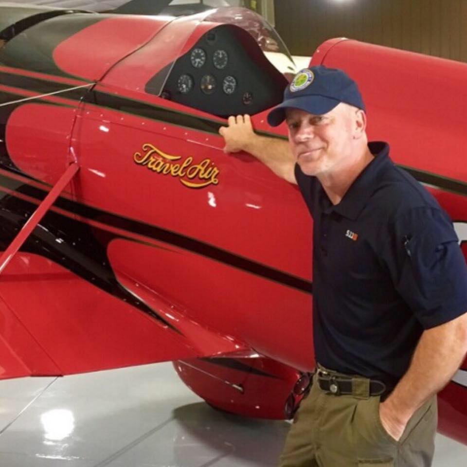 Jerry Marotta with his Travel Air biplane